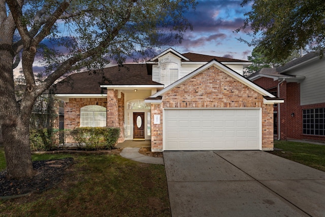 view of front of property featuring a garage