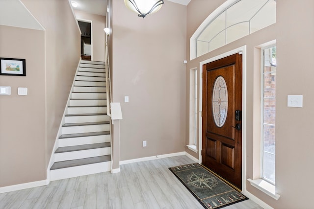 foyer with light wood-type flooring