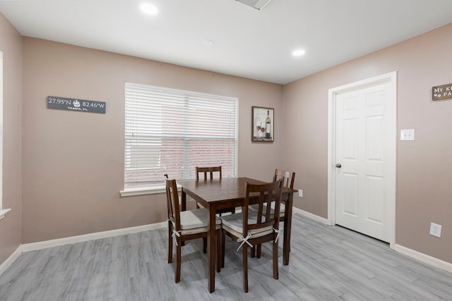 dining room featuring light wood-type flooring