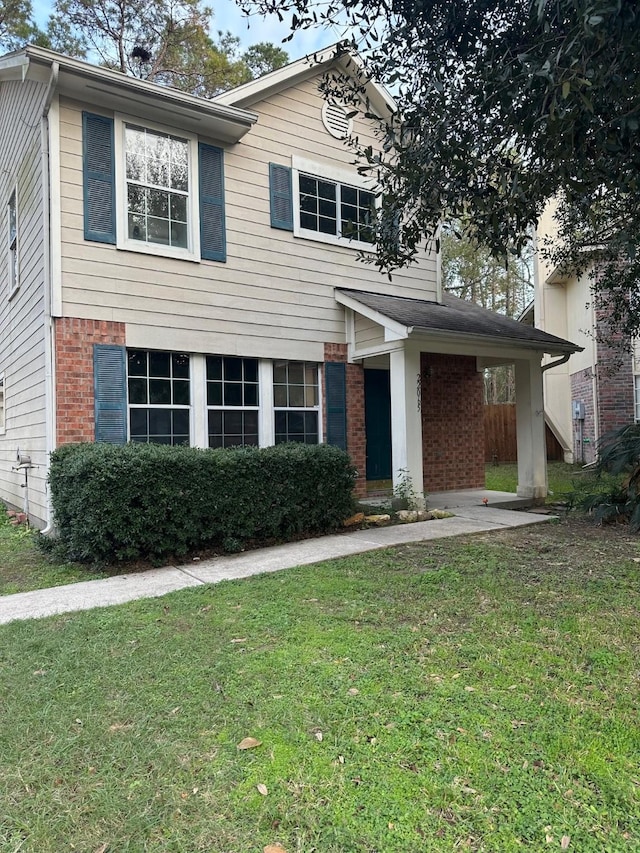 view of front of property with a front yard