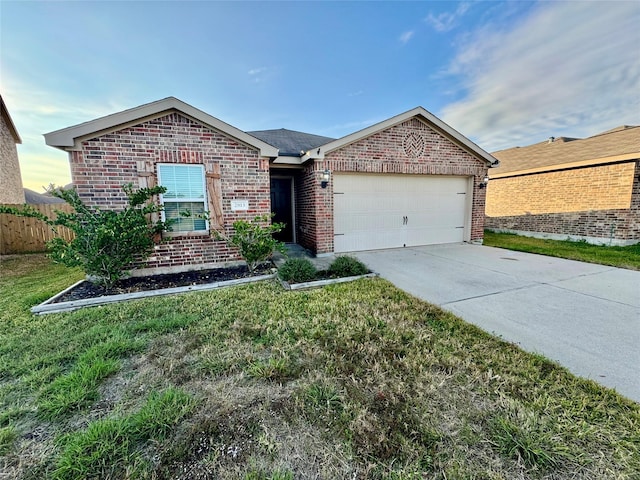 ranch-style home with a front yard and a garage