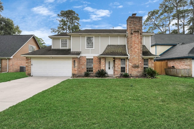 view of front property featuring central AC, a front yard, and a garage