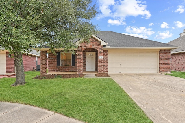 ranch-style home with cooling unit, a garage, and a front lawn