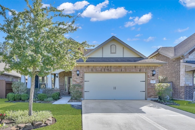 view of front facade with a front lawn and a garage