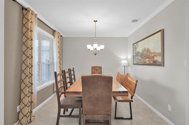 tiled dining room with a notable chandelier and crown molding