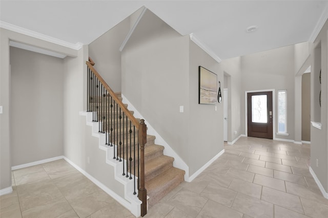 foyer entrance with ornamental molding