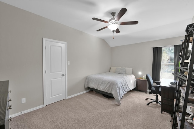 carpeted bedroom featuring ceiling fan and lofted ceiling