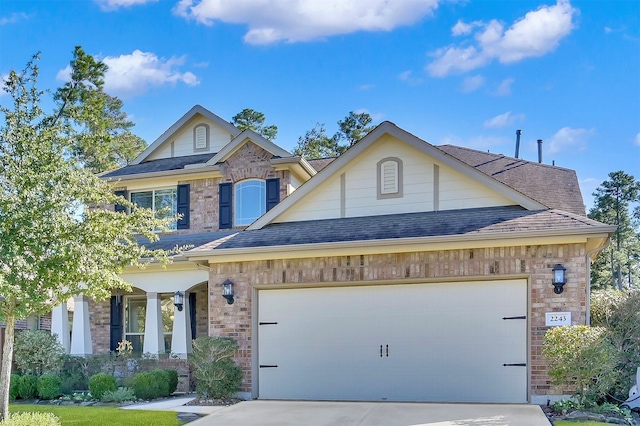 craftsman-style home with a garage