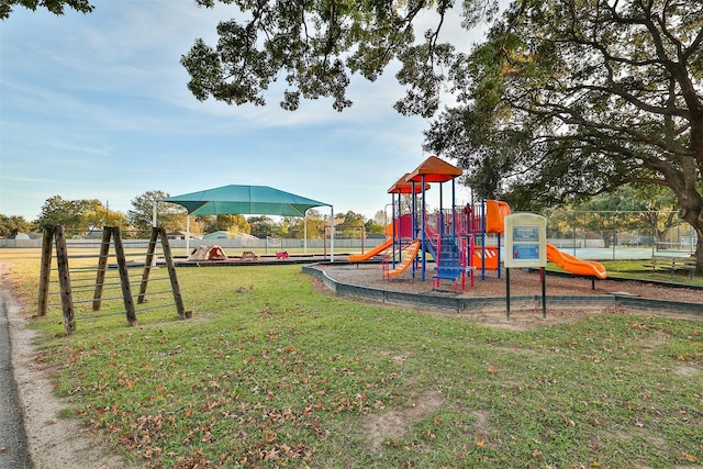 view of playground featuring a yard