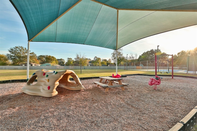 view of play area featuring a lawn