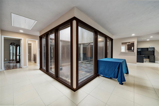 entryway featuring light tile patterned flooring