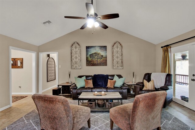 tiled living room with ceiling fan and lofted ceiling