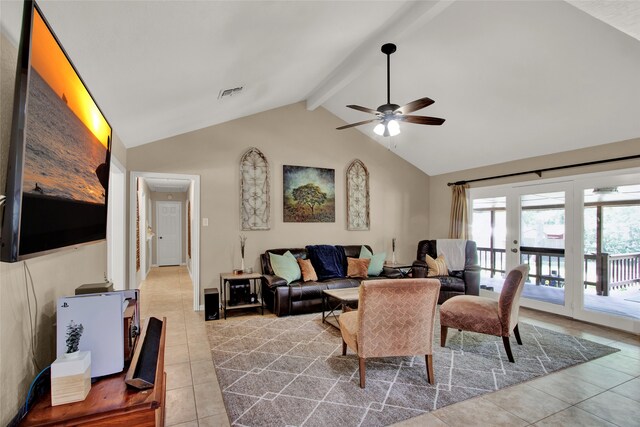 tiled living room with ceiling fan, french doors, and lofted ceiling with beams