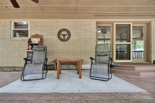 view of patio featuring ceiling fan