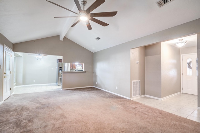 unfurnished living room with lofted ceiling with beams, light colored carpet, and ceiling fan