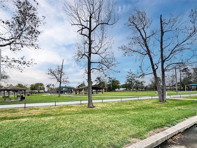 view of community featuring a lawn and a gazebo