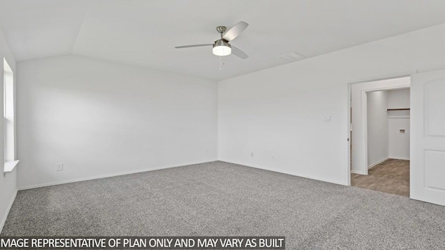 carpeted empty room featuring vaulted ceiling and ceiling fan