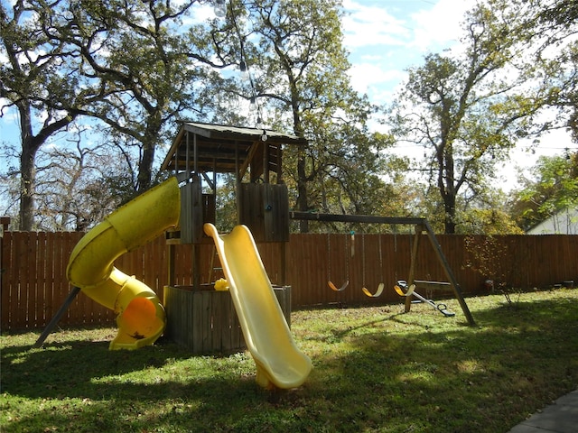 view of playground featuring a yard