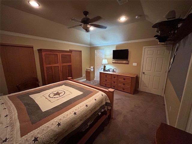 bedroom with ceiling fan, carpet, vaulted ceiling, and ornamental molding