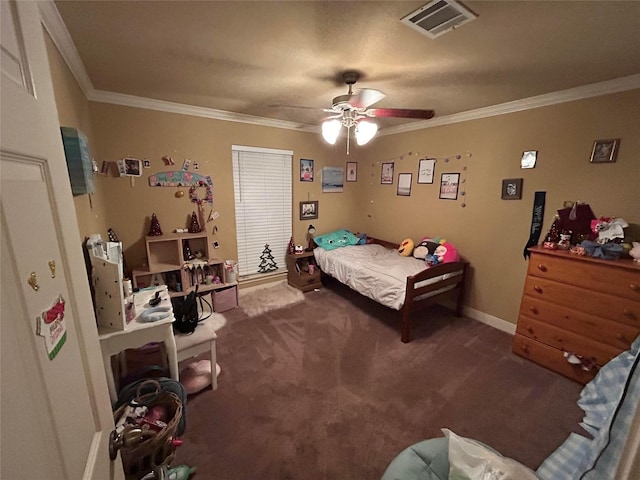 carpeted bedroom with ceiling fan and crown molding