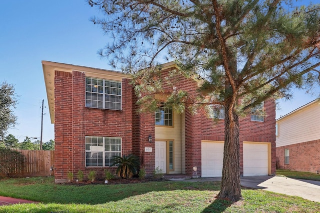 view of front facade featuring a front lawn and a garage