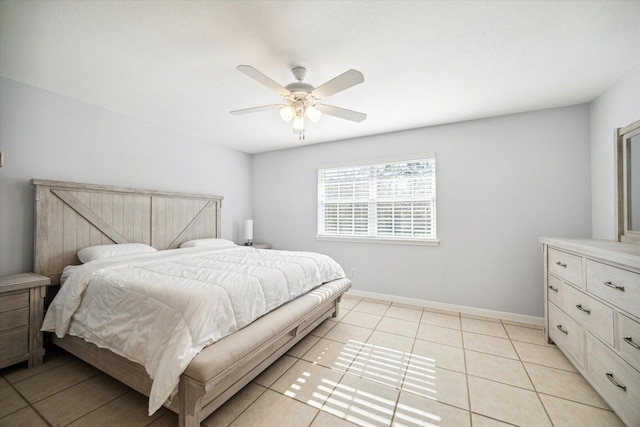 bedroom featuring ceiling fan and light tile patterned floors