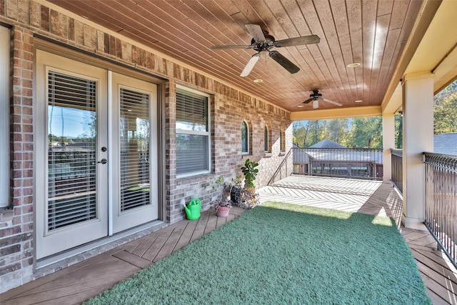 exterior space featuring a porch and ceiling fan