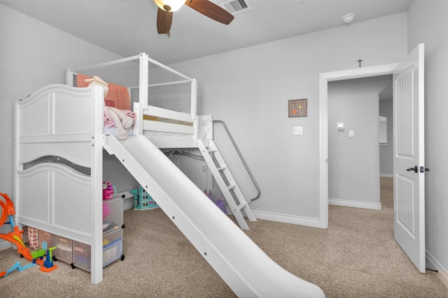 carpeted bedroom with ceiling fan