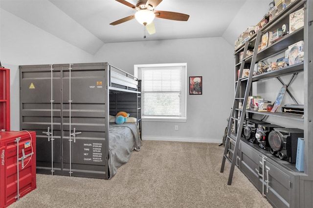 carpeted bedroom with ceiling fan and lofted ceiling