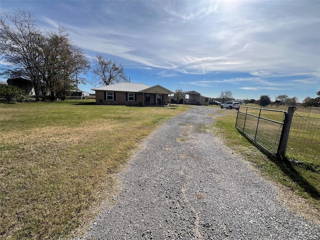 view of front of home featuring a front lawn