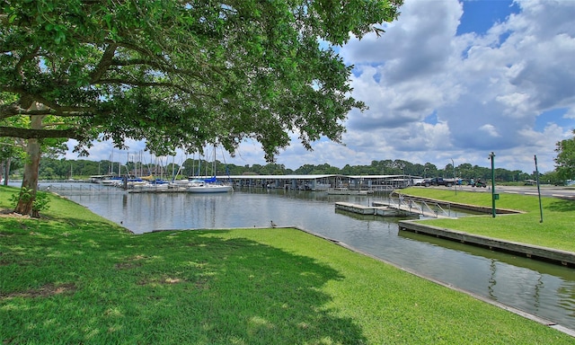 view of water feature with a dock