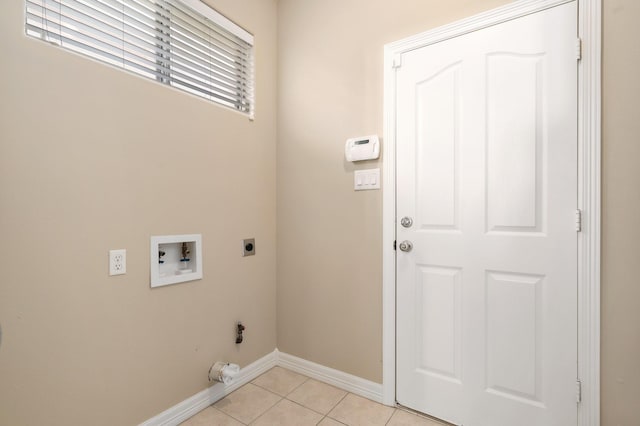 laundry area with light tile patterned floors, washer hookup, and hookup for an electric dryer