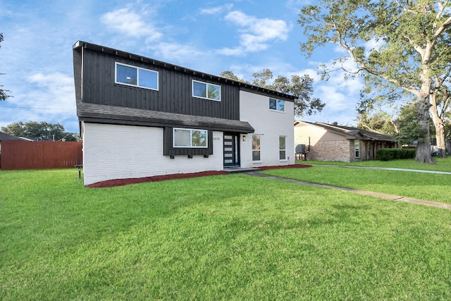 view of front of property with a front lawn