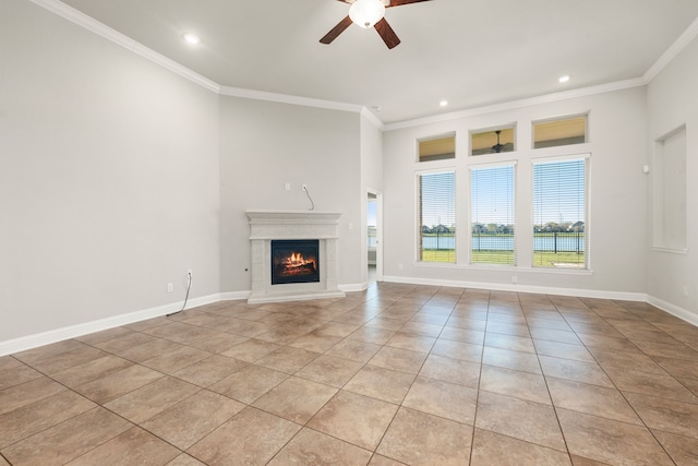 unfurnished living room featuring ceiling fan, light tile patterned flooring, and crown molding