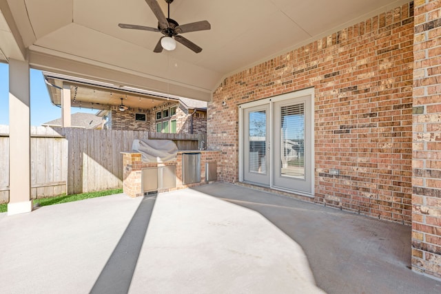 view of patio with ceiling fan