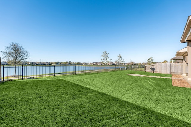 view of yard with a water view