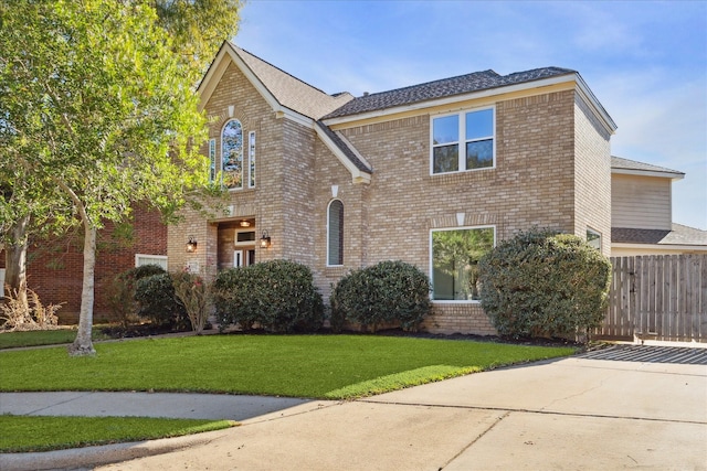 view of front facade with a front lawn