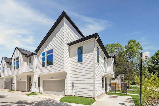 view of front of property with a garage