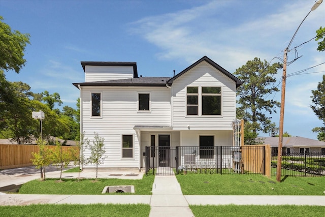 view of front facade with a front lawn