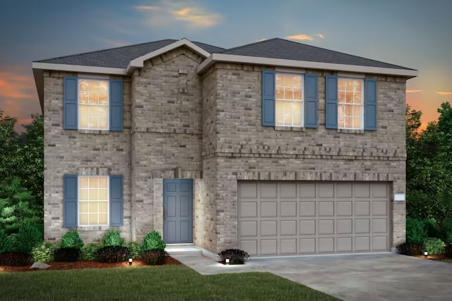 view of front of home with a garage