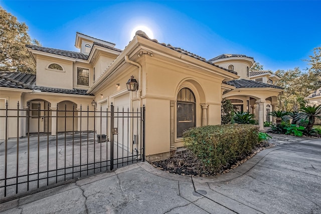 view of front of property with a garage