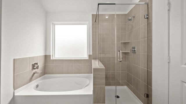 bathroom with independent shower and bath