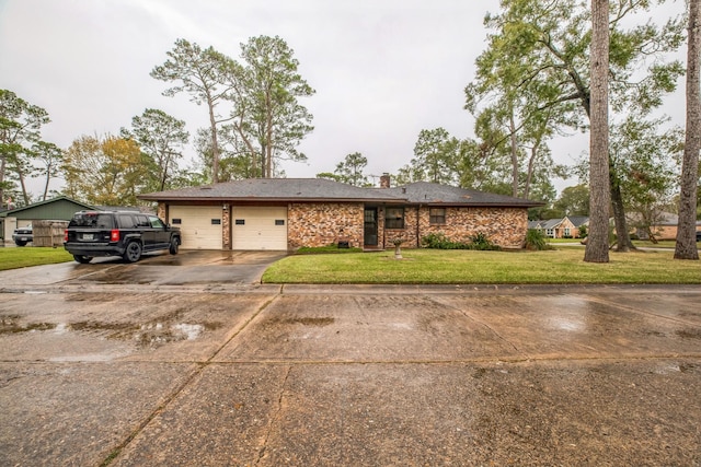 ranch-style house with a front yard and a garage