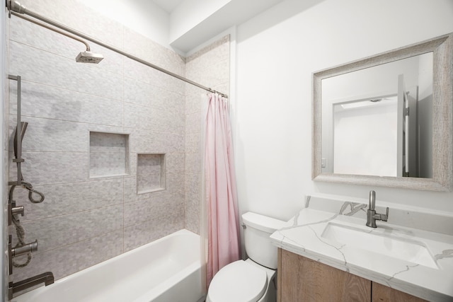 full bathroom with toilet, shower / bath combo, and vanity