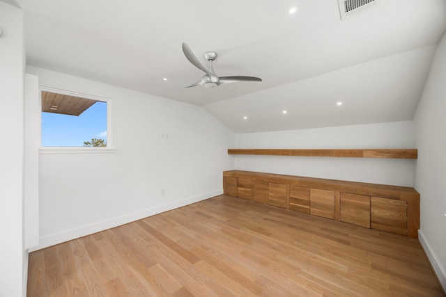 additional living space featuring ceiling fan, light hardwood / wood-style floors, and lofted ceiling