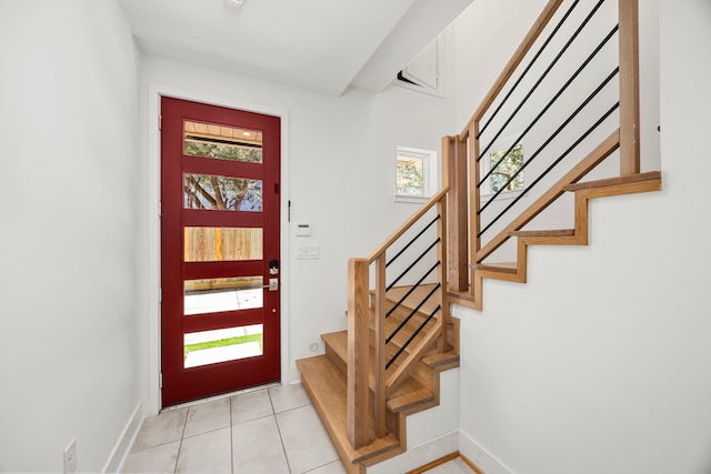 entrance foyer with light tile patterned floors