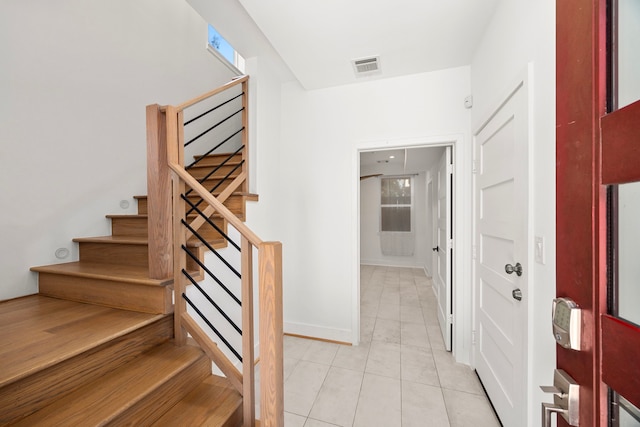 foyer with light tile patterned flooring