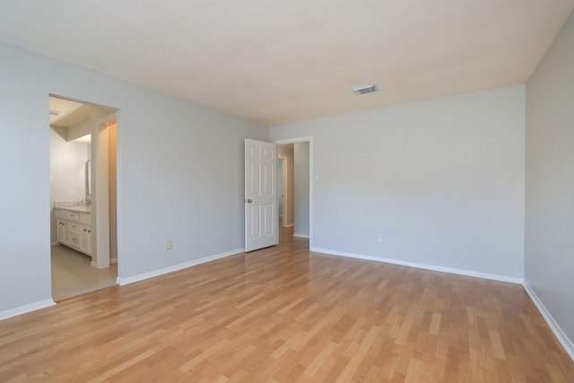 empty room featuring light wood-type flooring