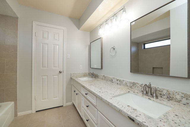 bathroom featuring tile patterned floors and vanity