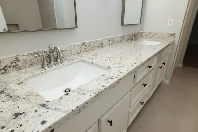 bathroom with vanity and tile patterned floors